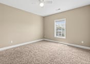 Thumbnail 25 of 39 - Spacious bedroom with window and neutral tones at The Lory of Greenway Village Apartments, Kentucky,