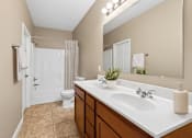 Thumbnail 6 of 39 - Bathroom with dual sinks and garden tub at The Lory of Greenway Village Apartments, Kentucky