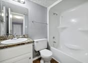 Thumbnail 13 of 15 - Bathroom with a sink toilet and a bath tub  at Governors House, Huntsville, AL