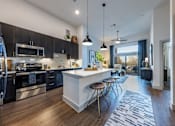 Thumbnail 1 of 47 - Kitchen at The Monroe Apartments, Austin, TX