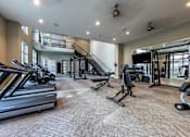 Thumbnail 41 of 47 - Gym with equipment at The Monroe Apartments, Austin, TX, 78741