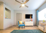 Thumbnail 7 of 23 - Living room with tv at 500 Fifth Apartments, Nashville, TN