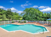 Thumbnail 11 of 18 - sparkling pool and sun deck