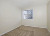 Thumbnail 6 of 23 - an empty room with carpet and a window