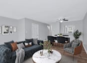 Thumbnail 3 of 25 - a living room with gray walls and a white marble coffee table