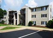 Thumbnail 16 of 17 - Apartment building with a flag on the balcony.