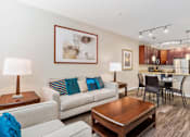 Thumbnail 5 of 16 - Living Room With Kitchen at The Beacon at Waugh Chapel, Gambrills, Maryland