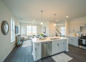 Thumbnail 12 of 20 - Open layout with kitchen and living room and large windows