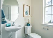 Thumbnail 17 of 20 - Half bathroom with window