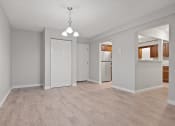 Thumbnail 26 of 37 - Dining area with closet and entrance to kitchen  at the River, Manchester, 03102