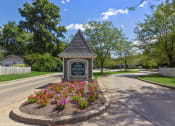 Thumbnail 11 of 20 - the welcome sign at the end of a street in a neighborhood with trees at Brookstone Village, Cincinnati