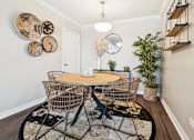 Thumbnail 6 of 92 - Dining room with round table at Esplanade at City Park, Louisiana