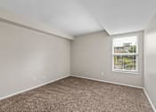Thumbnail 8 of 57 - Bedroom with gray walls and carpet at Creve Coeur, Creve Coeur, MO