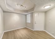 Thumbnail 7 of 50 - Dining room area with wood style floors at Pembroke Pines Landings, Pembroke Pines, FL, 33025