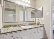 Thumbnail 18 of 51 - a bathroom with a sink and a mirror at The Glen at Highpoint, Dallas, 75243