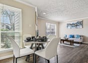 Thumbnail 6 of 51 - a dining room with a table and chairs and a window at The Glen at Highpoint, Dallas, 75243