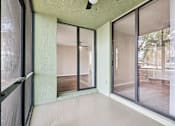 Thumbnail 18 of 55 - A room with a green wall and a ceiling fan. at Lakeside Glen Apartments, Melbourne