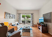 Thumbnail 1 of 45 - Living Area With Balcony at Heritage at Stone Mountain, Northglenn, 80233
