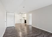 Thumbnail 26 of 57 - A room with a wooden floor and white walls. at Millennium at Creve Coeur, Creve Coeur