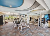 Thumbnail 27 of 43 - Gym with a variety of equipment at Whisper Lake Apartments, Winter Park, Florida