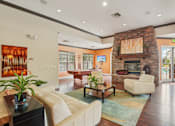 Thumbnail 19 of 45 - Clubroom With Fireplace at Heritage at Stone Mountain, Northglenn, Colorado