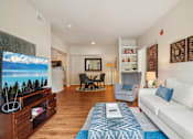 Thumbnail 2 of 45 - Living Room With TV at Heritage at Stone Mountain, Colorado, 80233