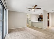 Thumbnail 53 of 58 - A spacious room with a ceiling fan and carpeted floor. at Canopy Glen, Norcross, GA, 30093