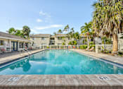Thumbnail 30 of 35 - A swimming pool with the number 6F painted on the side. at Sarasota South Apartments, Bradenton, FL, 34207