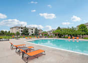 Thumbnail 36 of 45 - Pool With Sundecks at Heritage at Stone Mountain, Northglenn, 80233