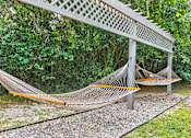 Thumbnail 59 of 64 - Two hammocks at Lofts of Wilmington, Wilmington, North Carolina