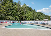 Thumbnail 50 of 70 - A large outdoor swimming pool  at Heritage at the River, Manchester, 03102