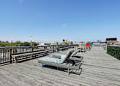 Thumbnail 46 of 65 - Wooden deck with lounge chairs at The View at Old City, Philadelphia, PA