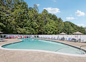 Thumbnail 48 of 70 - A large outdoor swimming pool at Heritage at the River, New Hampshire, 03102