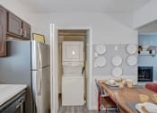 Thumbnail 15 of 50 - Kitchen with a  washer and dryer at Governor's Park, Fort Collins, 80525