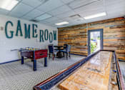 Thumbnail 27 of 37 - Game room with a pool table and game room sign  at Union Heights Apartments, Colorado Springs, CO