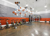 Thumbnail 19 of 58 - A gym with exercise bikes and weights. at Canopy Glen, Georgia, 30093