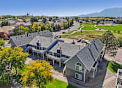 Thumbnail 42 of 44 - A residential area with houses and trees. at Windmill Apartments, Colorado Springs, 80916