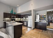Thumbnail 28 of 37 - Clubhouse Kitchen at Woodland Hills Apartments,