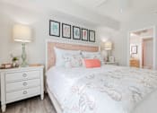 Thumbnail 18 of 117 - a bedroom with a bed and two night stands at Heritage Bay, Florida