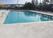 Thumbnail 17 of 24 - Pool  at River Crossing Apartments, Thunderbolt, GA, 31404