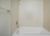 Thumbnail 11 of 31 - A bathroom with a bathtub and a shower at Arcadia Townhomes, Federal Way, WA