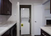 Thumbnail 16 of 50 - Washer and dryer in a small room in a kitchen  at Governor's Park, Fort Collins, 80525