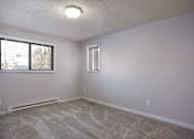 Thumbnail 28 of 50 - Living room of an empty house with a window  at Governor's Park, Fort Collins, 80525