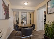 Thumbnail 3 of 23 - Dining room with a table and chairs at Mountain Run Apartments, New Mexico, 87111