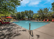 Thumbnail 10 of 23 - Swimming Pool With Relaxing Sundecks at Mountain Run Apartments, New Mexico