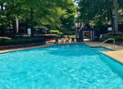 Thumbnail 14 of 23 - Swimming pool at The Pointe at Irving Park, Greensboro, NC, 27408
