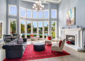 Thumbnail 7 of 17 - Clubhouse with Fireplace at Bridford Lake Apartments, Greensboro, North Carolina
