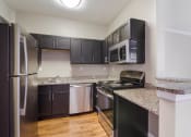 Thumbnail 1 of 17 - Kitchen at Bridford Lake Apartments, Greensboro