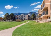 Thumbnail 1 of 33 - Lush Green Courtyard With Walking Paths at Broadmoor Springs, Colorado