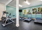 Thumbnail 24 of 32 - Modern Fitness Center at Cedar Springs Apartments, North Carolina